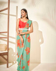 Floral Saree Paired with Red Blouse