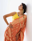 Traditional Banarasee Bandhani Saree In a Vibrant Orange Color