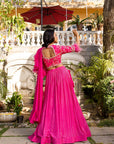 Pink Drape Ruffle Lehenga Set with Hand Embroidered Blouse and Feather Detail