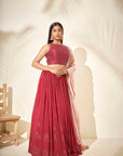 Maroon Georgette Crepe One-Shoulder Crop Top and Pleated Skirt Lehenga with Mirror and Zardosi Handwork