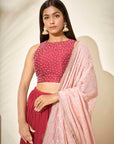 Maroon Georgette Crepe One-Shoulder Crop Top and Pleated Skirt Lehenga with Mirror and Zardosi Handwork
