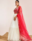 Hand Embroidered Bustier Blouse with Embellished Net Lehenga and Dupatta