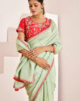 Shimmer Saree with Cutwork Borders and Heavy Hand Embroidered Blouse