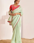 Shimmer Saree with Cutwork Borders and Heavy Hand Embroidered Blouse