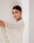 Ivory dress with embellished cape