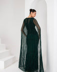 Midnight green heavily embellished gown with cape