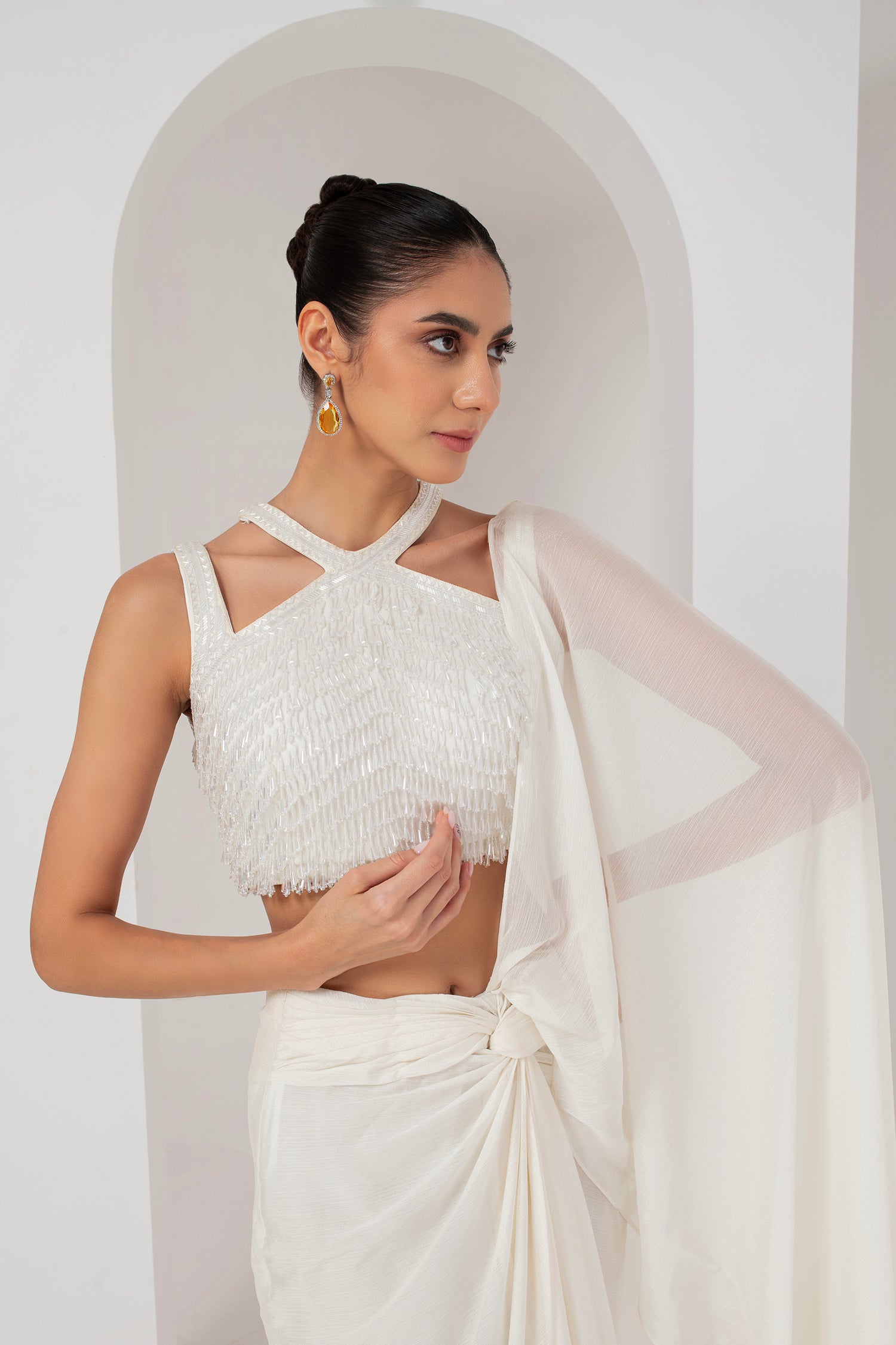 Ivory crystal embellished blouse & stitched saree