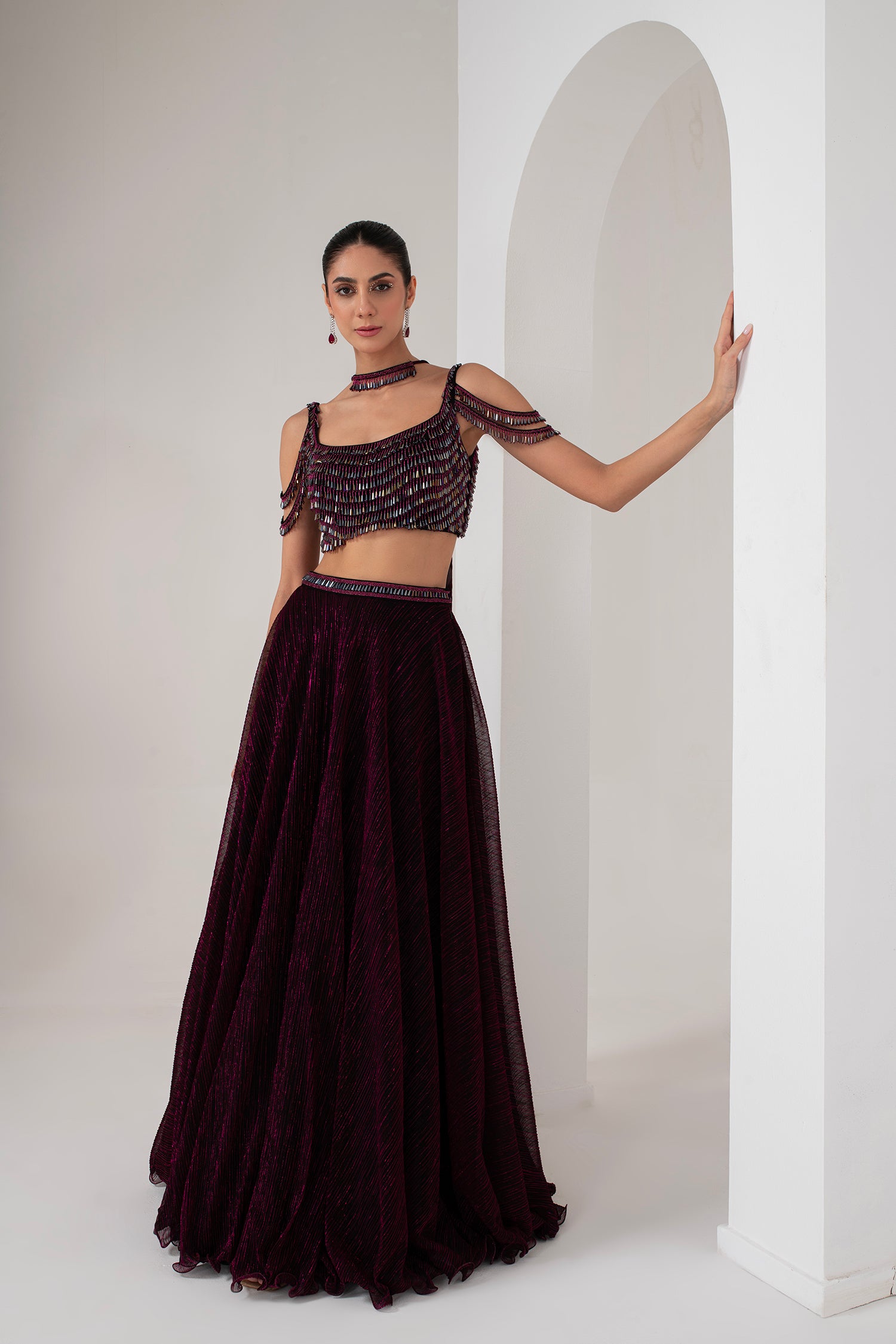 Black base with pink lurex crystal hanging blouse with lehenga