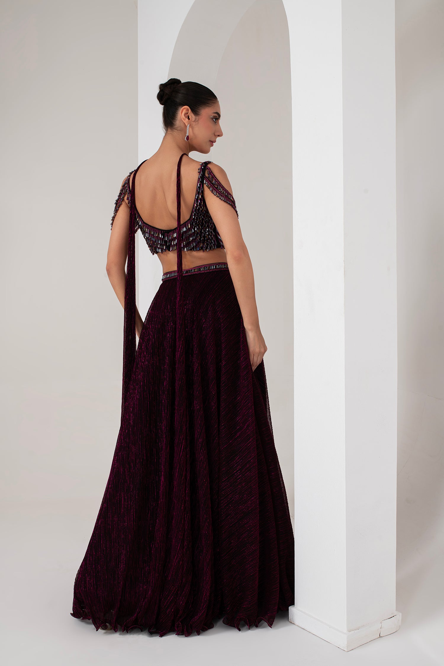 Black base with pink lurex crystal hanging blouse with lehenga