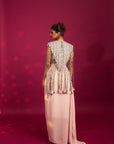 Peachy Pink Ajrakh Stripwork Jacket Paired Up With Peachy Pink Bralette And Drape Dhoti Skirt