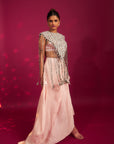 Peachy Pink Ajrakh Stripwork Jacket Paired Up With Peachy Pink Bralette And Drape Dhoti Skirt
