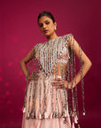 Peachy Pink Ajrakh Stripwork Jacket Paired Up With Peachy Pink Bralette And Drape Dhoti Skirt