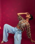 Powder Blue Ajrakh Stripped Jacket With Embellished Brallete And Inverted Pleated Pants
