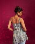 Powder Blue Ajrakh Embroidered Assymetric Peplum Top With Drape Dhoti Skirt