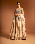 Beige Fully Embroidered Ajrakh Blouse With Tiered Lehenga And Ruffle Dupatta Set