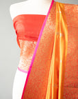 Sunset Orange Handwoven Silk Sari And Red Color Unstitched Blouse