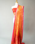 Sunset Orange Handwoven Silk Sari And Red Color Unstitched Blouse