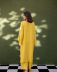 Khushboo & Pankaj Muted Marigold Fringe Kurta Set
