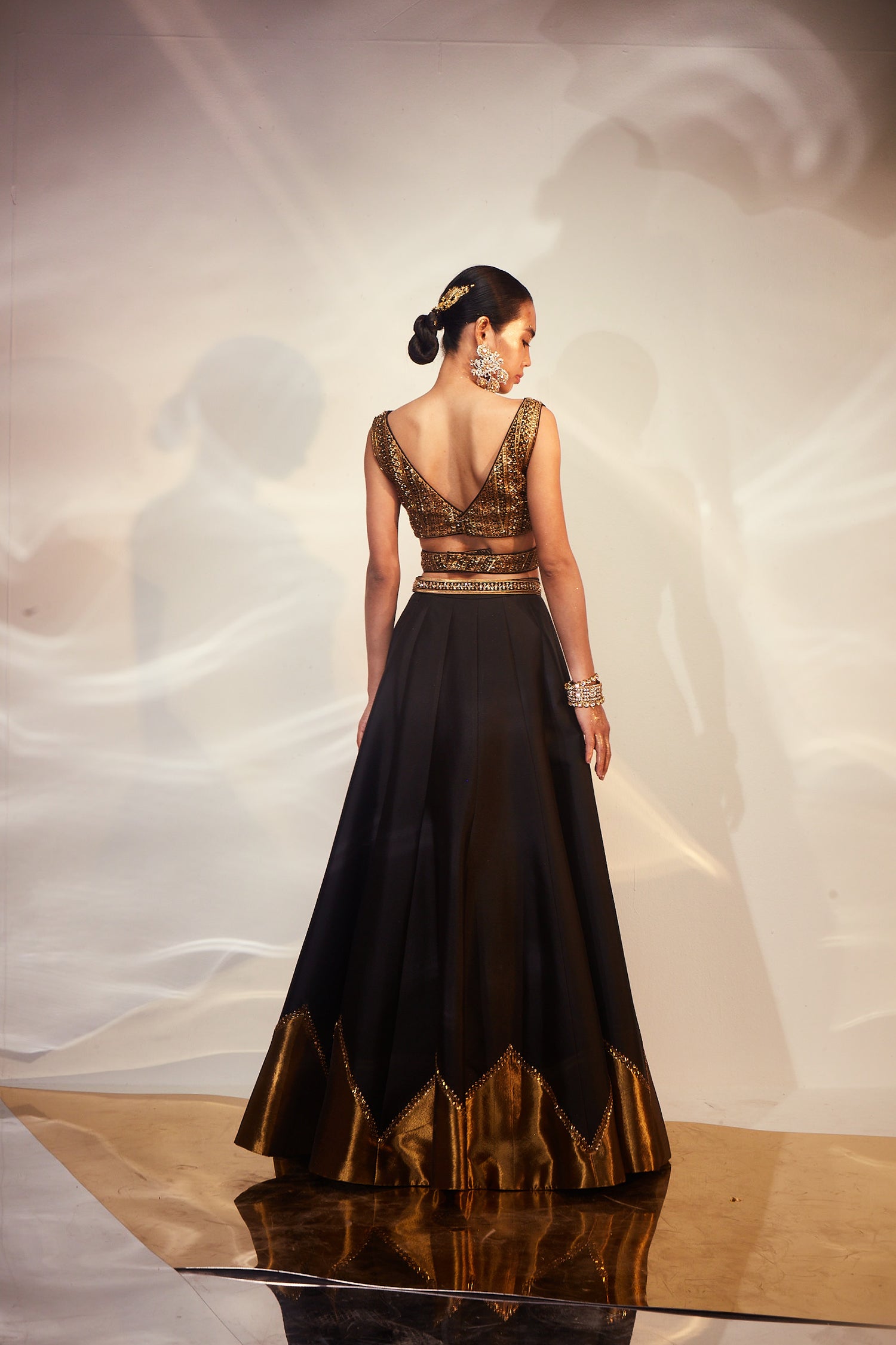 Black & gold tisssue work lehenga
