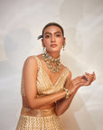 Ivory with gold work lehenga