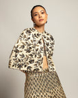 Lissome Faded Ivory Blouse & Cape With Comely Lehenga