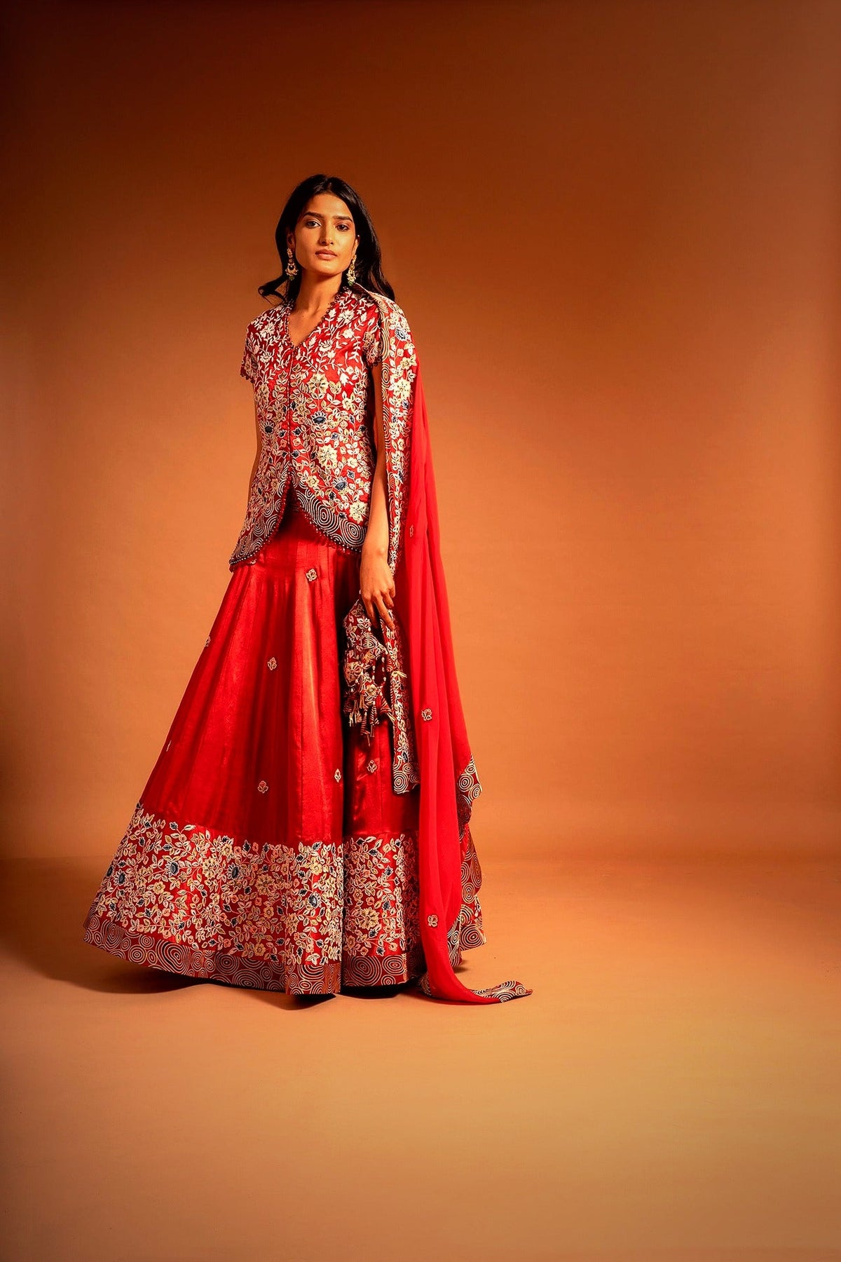 The Red Lehenga Edit — red handcrafted jacket lehenga with cape dupatta by Sejal Kamdar