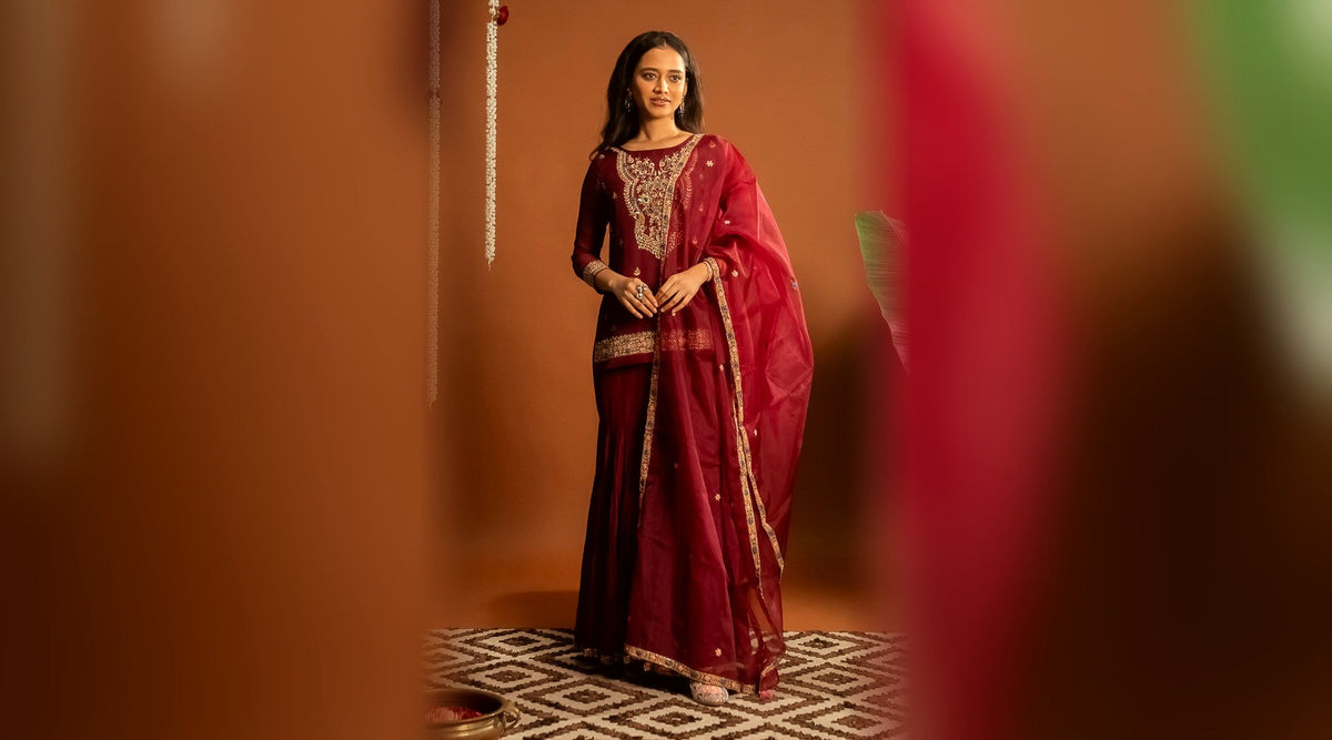 Maroon sharara set worn for a first Karwa Chauth moonrise look