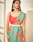 Floral Saree Paired with Red Blouse