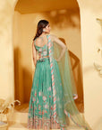 Green Sleeveless Mirror Work Lehenga Set with Pleated Skirt and Net Dupatta