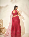 Maroon Georgette Crepe One-Shoulder Crop Top and Pleated Skirt Lehenga with Mirror and Zardosi Handwork