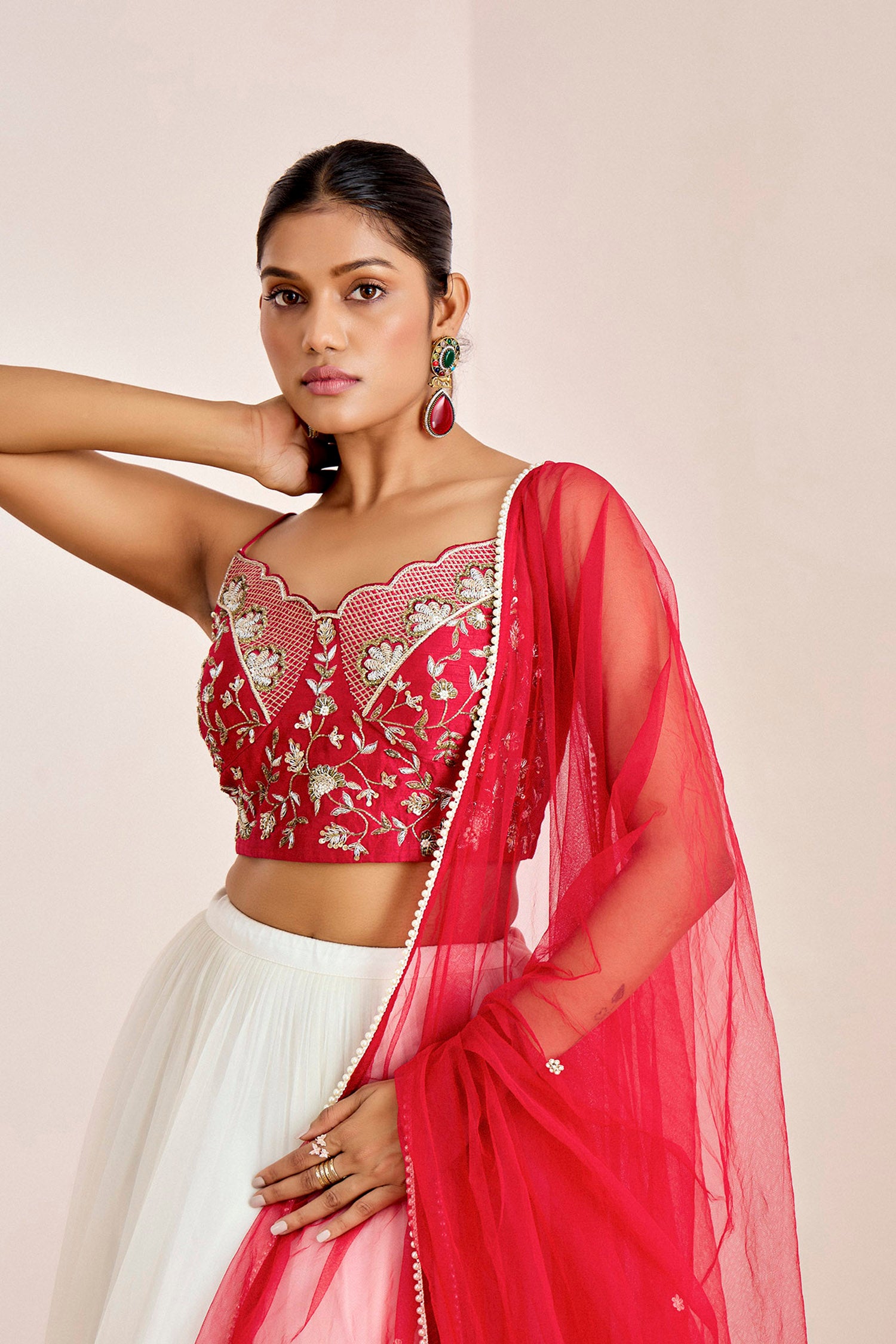 Hand Embroidered Bustier Blouse with Embellished Net Lehenga and Dupatta