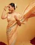 Traditional Georgette Banarasi Bandhani Saree in Light Orange and Blue