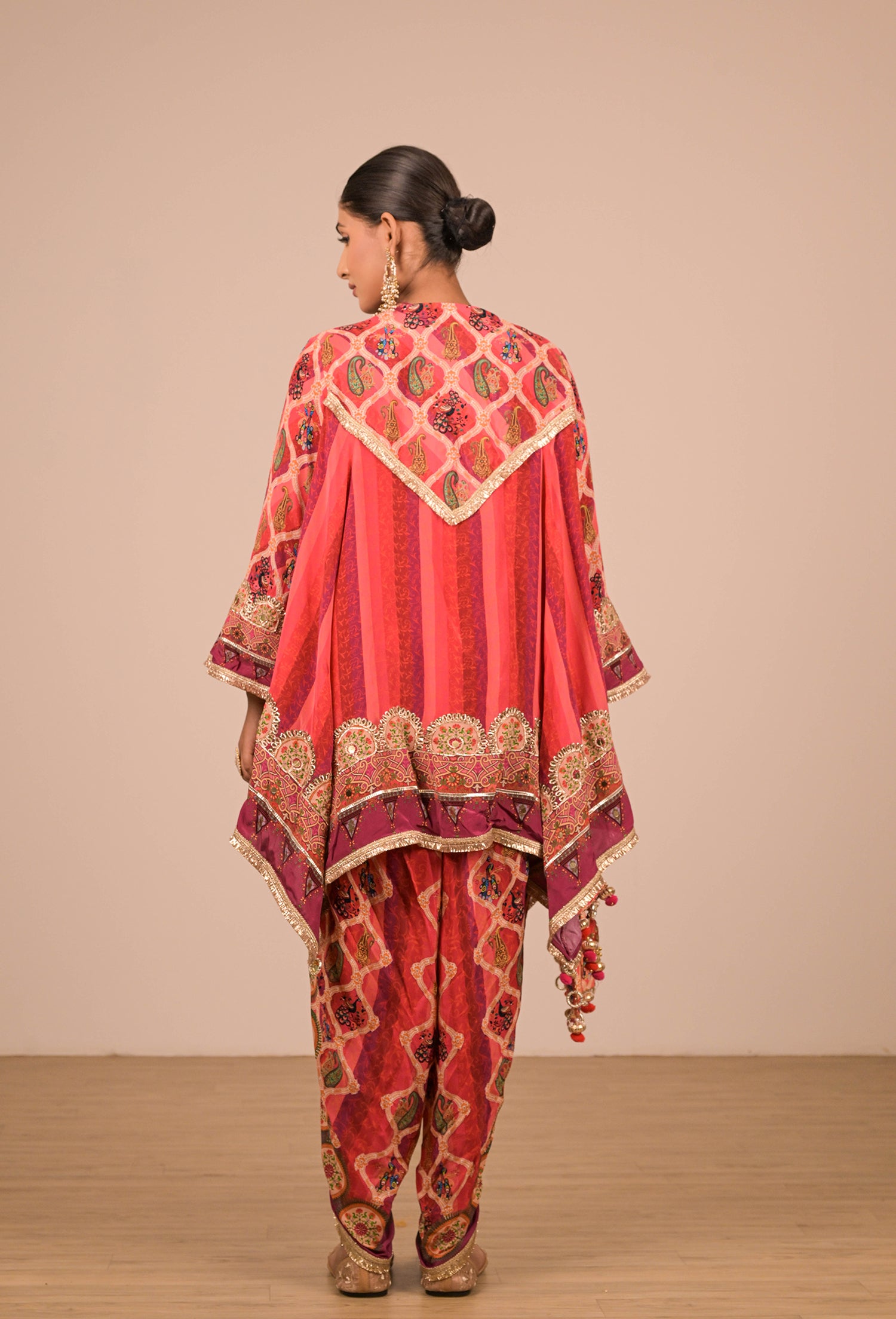 Vibrant Persian Red Crepe Suit Set with Tulip Pants and Heavy Embroidered Potli Bag