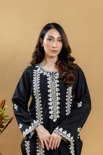 Khushboo &amp; Pankaj Noir Ivory Embroidered Suit Set
